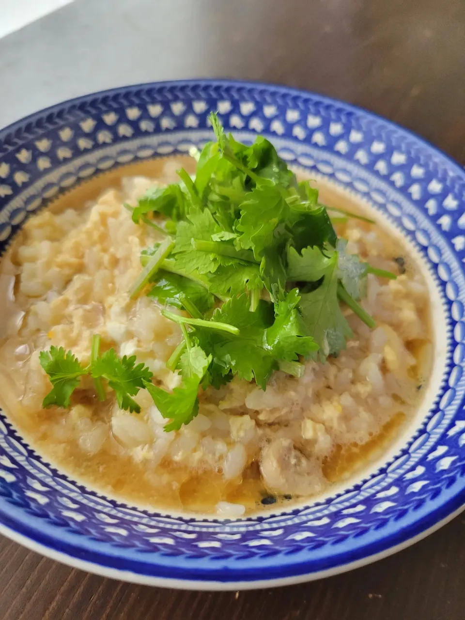 エスニック風おじや（もつ鍋スープに、ナンプラー、レモン汁、胡麻油、パクチーちょい足し）|あんさん