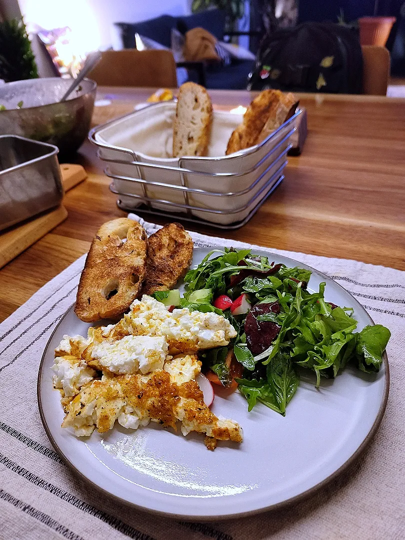 Cheese baked in the oven with garlic and olive oil,  bread and salad|Vera Andrianova Forwerkさん