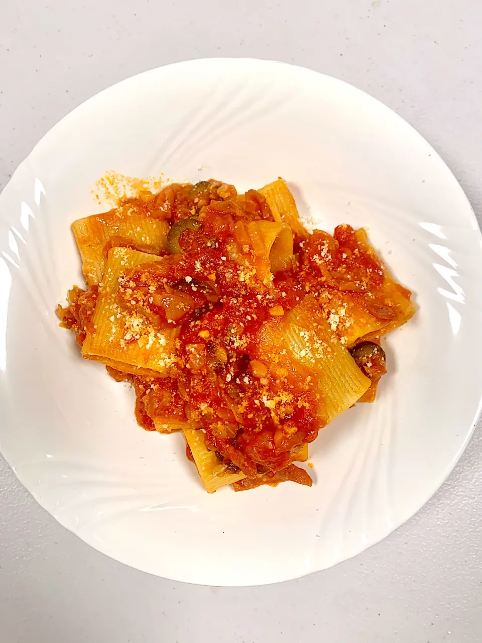 Snapdishの料理写真:Paccheri with Anchovies, Olives and Tomato|gonbenさん