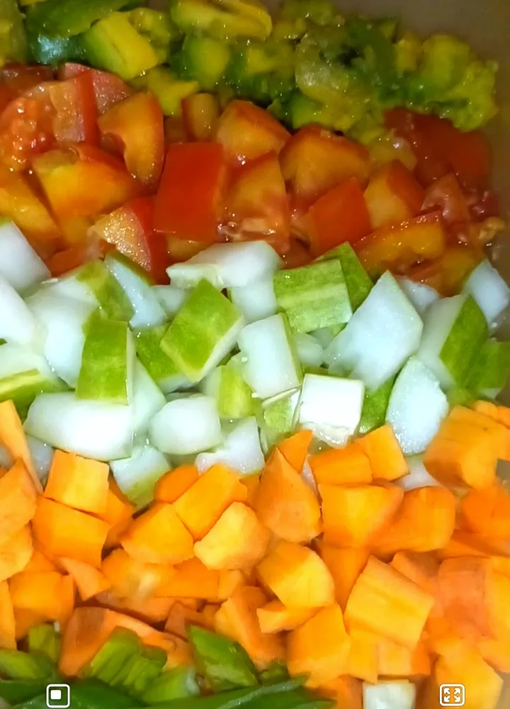 Snapdishの料理写真:veggies mixture of avocado tomatoes cucumber carrot and spring onions|Chioma Anyanwuさん