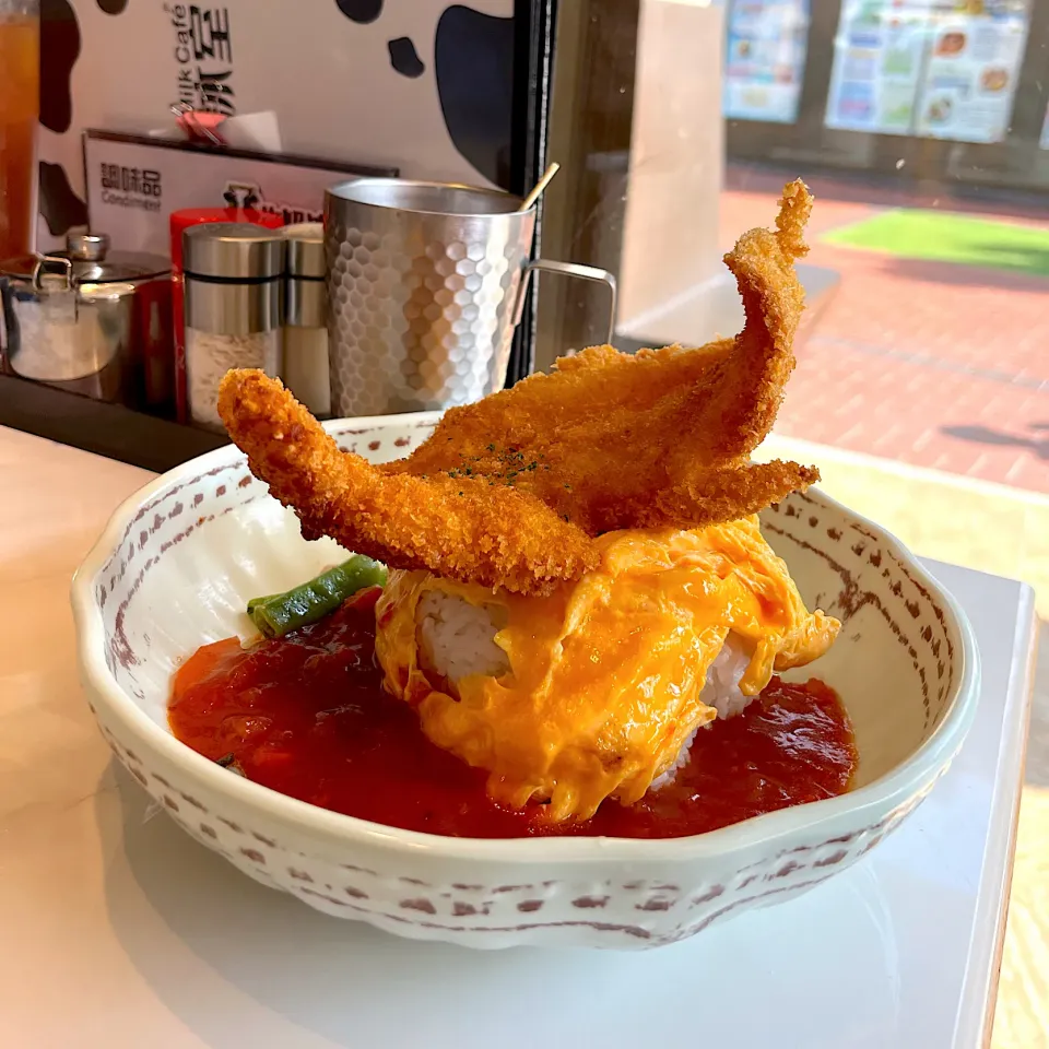 Cutlet fish fillet and omurice served with tomato sauce|skyblueさん