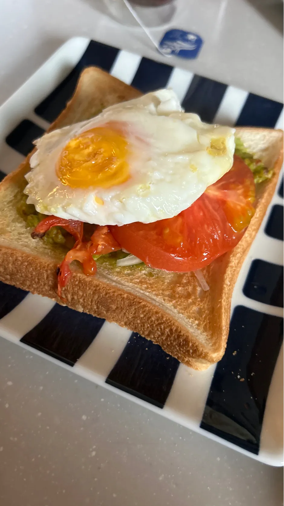 Snapdishの料理写真:egg harissa avocado tomato and onion toast|JSFさん