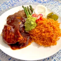 Snapdishの料理写真:pollo con mole y arroz mexicano.|Iwaoさん