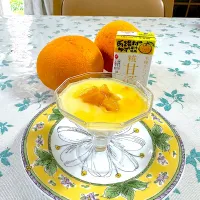 Snapdishの料理写真:麹ゆずブレンドプリンの甘夏ソースがけ|eatさん