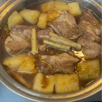 Snapdishの料理写真:骨付き豚肉スペアリブオレンジ煮物|펭귄  마사노부(ペンギン政信)さん