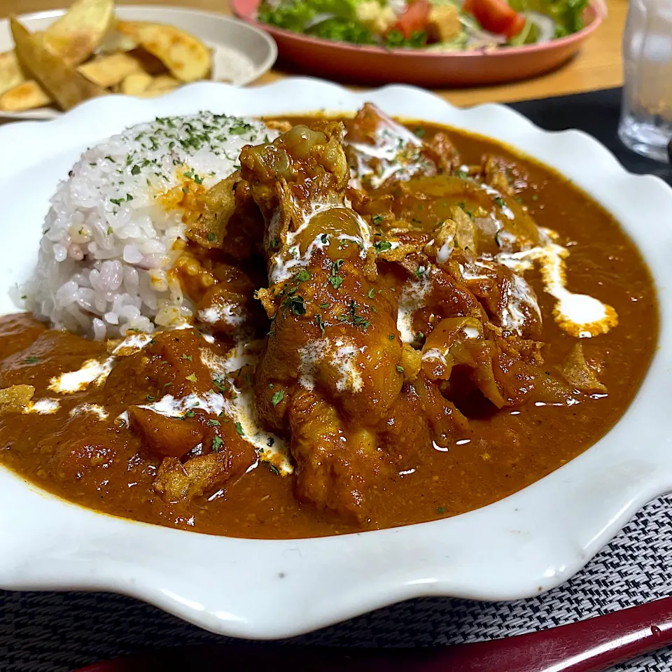 Snapdishの料理写真:鶏手羽元のカチャトーレ(鶏肉の甘酒トマト煮)からのバターチキンカレー|sakurakoさん