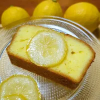 Snapdishの料理写真:無農薬レモンのしっとりパウンド🍋

甘酸っぱさがたまらない✨

ビタミンCを壊さないように、レモンをシロップ漬けにし、焼き立てパウンドケーキに打ち込んだ夏に嬉しい爽やかな味☺

1切れ89kcalのギルトフリースイーツです🌳