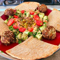 Chickpeas and beets hummus with tabouli salad falafel and whole wheath pita.|Juan C. Mercedさん