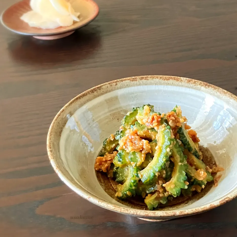 Snapdishの料理写真:cocoaさんの料理 ゴーヤの胡麻煮〜bitter gourd with soy sauce and sesame|うさかめさん