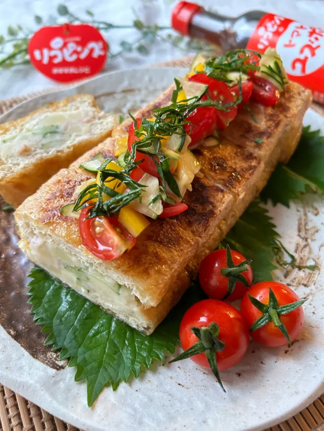 Snapdishの料理・レシピ写真:【食卓を紡ぐおたより便】トマポンだれで食べる栃尾揚げのポテサラサンド｜家計の味方！厚揚げチャレンジ♪