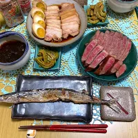 Snapdishの料理写真:さんま、お肉、チャーシュー煮卵、もずく、ゴーヤの漬物|はるさん