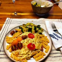 Snapdishの料理写真:Pasta with pickled tomatoes, seeds, garlic and cucumber salad|Vera Andrianova Forwerkさん