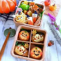 Snapdishの料理写真:👻肉巻きチーズおにぎりと
🎃オムすびのハロウィン弁当