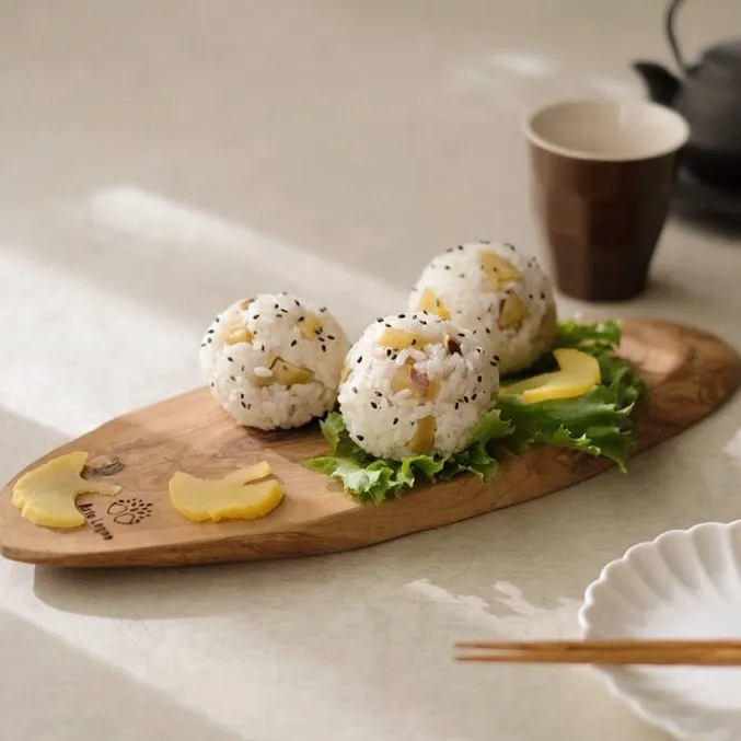 Snapdishの料理写真:さつまいもご飯のおにぎり|ohanaさん