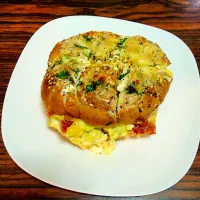 Snapdishの料理写真:Parmesan Garlic Bagel Stuffed with Egg and Bacon|Tam Tamさん