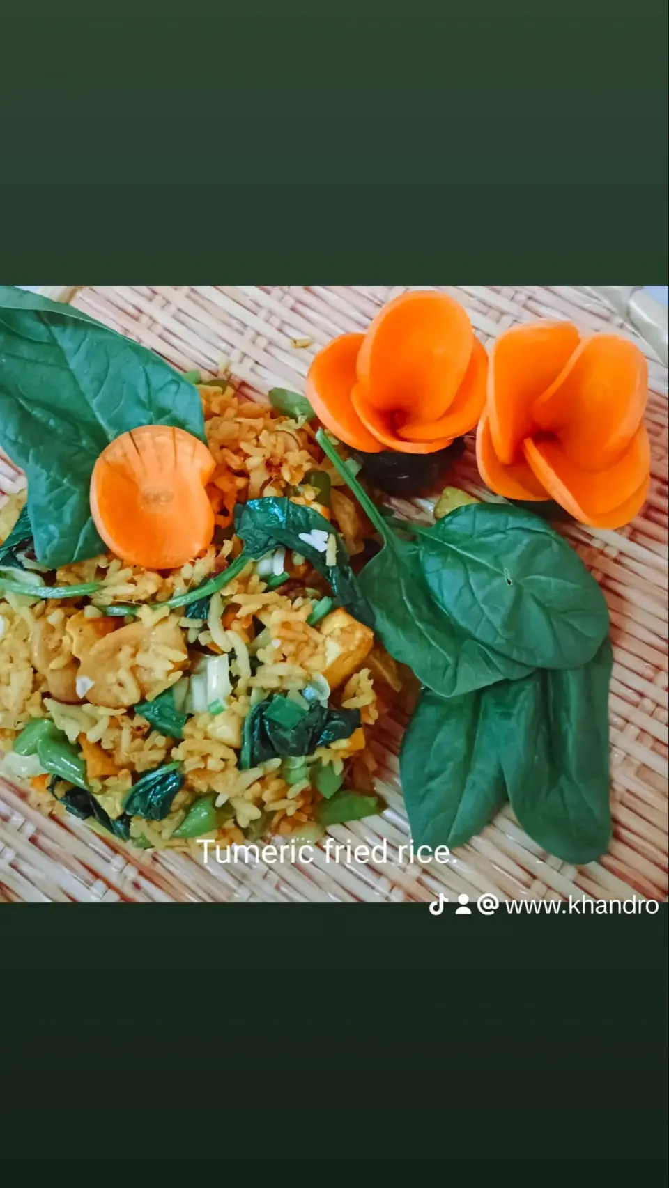 Turmeric fried rice with cucumber and carrots flowers as a salad.|Priyamayaさん