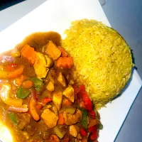 Rice and chicken curry sauce