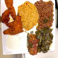 Spicy chicken strips with homemade sauce with collard greens with jambalaya rice and  vegetarian beans with blue cheese sauce |Kareem Boogieさん