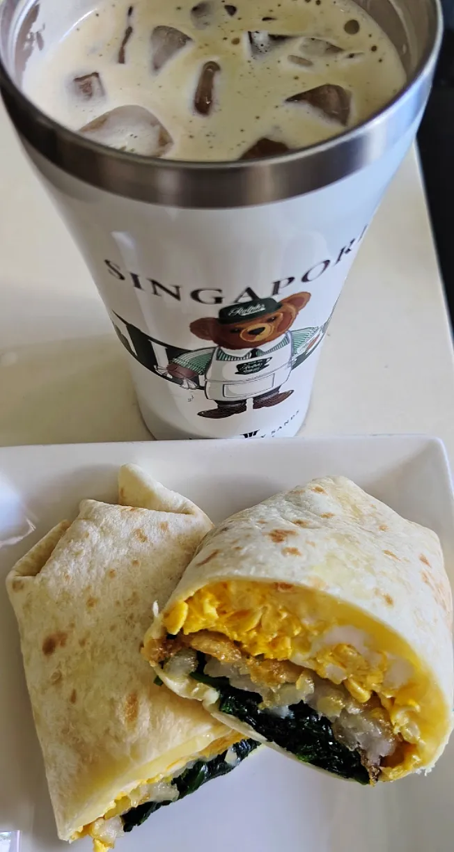 Good morning Happy Wrap🌯 : Hash brown, 2 scrambled eggs, spinach, mayo, mozzarella cheese, Mos ketchup 1 pack😋😍🤭iced coffee ☕😋😋😋|🍒lynnlicious🍒さん