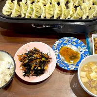 頂きもの目玉　ひじきの煮物　餃子　豆腐の酸辣湯風スープ　かぼちゃとツナの塩昆布和え|おさむん17さん