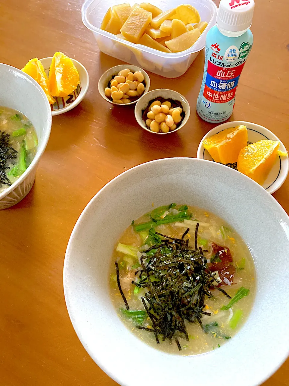 鶏雑炊・大豆煮・糠漬け沢庵・ネーブル・ヨーグルトドリンク|さくたえさん
