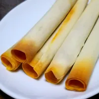 ロングウインナーの焼き春巻き|ぱんだのままんさん