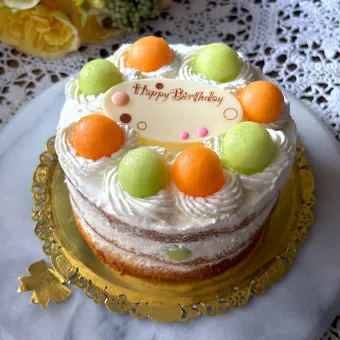 Snapdishの人気料理写真:🍈メロンバースデーケーキ🧡💚