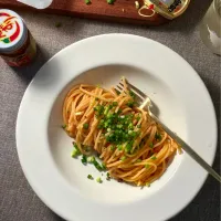 自家製塩辛とかんずり、ペコリーノロマーノのトマトソースパスタ /青木酒造 雪男純米|まる(丸大豆)さん