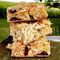 Toasted coconut, dried cranberry and white chocolate bars.|Dean M Rogersさん