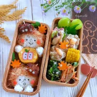 
ベレー帽の女のコおにぎりの秋弁当