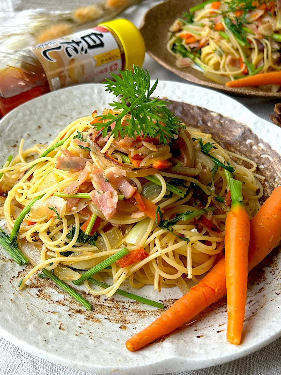 ミニキャロットとベーコンの和風パスタ|まなまな♡さん
