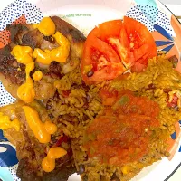 Teriyaki chicken, chipotle, sauce, beans, and rice, chipotle style with a slice of tomato|Kareem Boogieさん