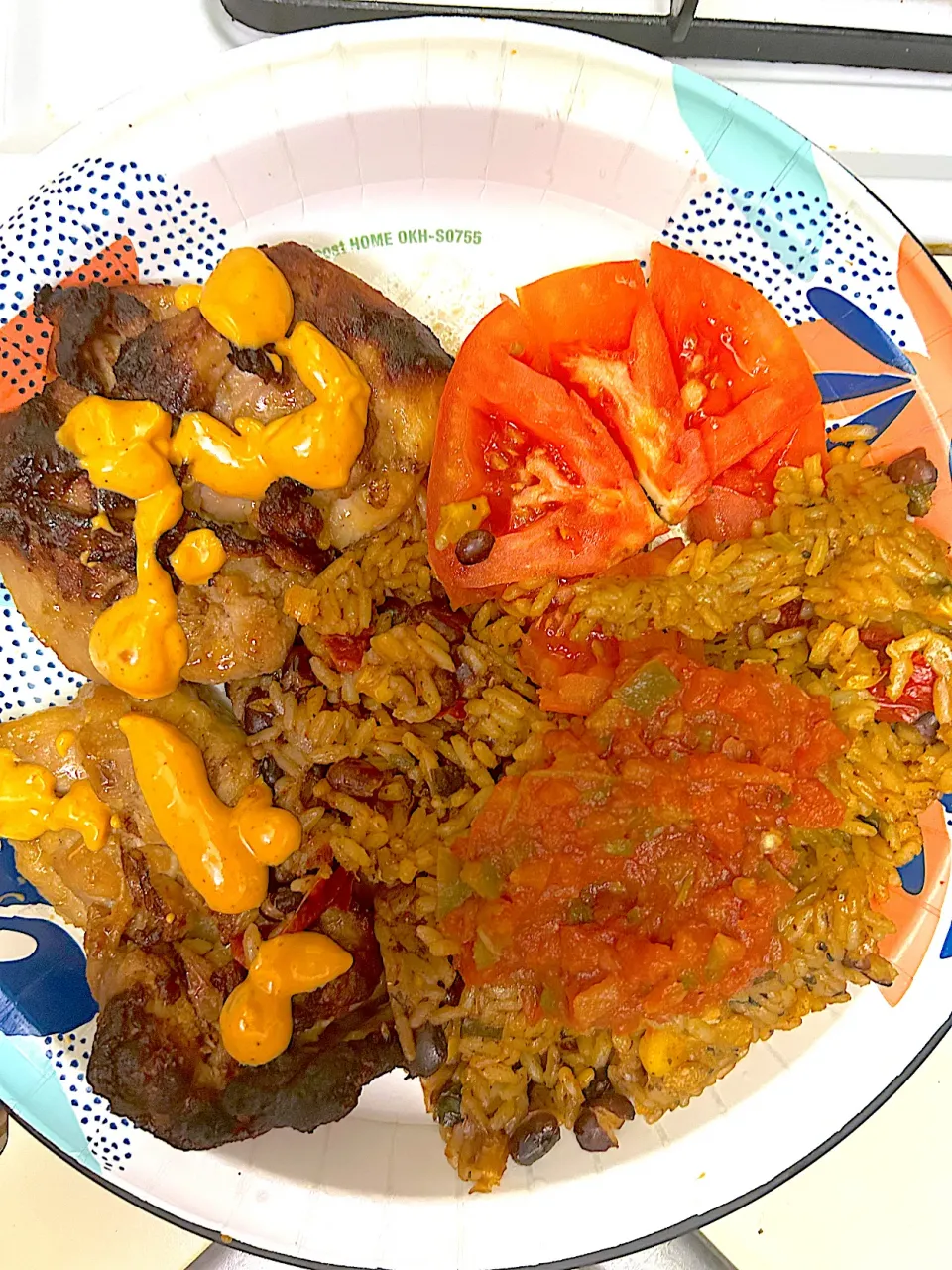 Teriyaki chicken, chipotle, sauce, beans, and rice, chipotle style with a slice of tomato|Kareem Boogieさん