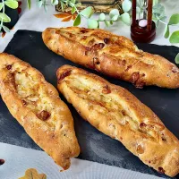 cocco+さんの料理 朝日が似合うシリーズ・全粒粉のチーズだだもれのバターフィセル✨