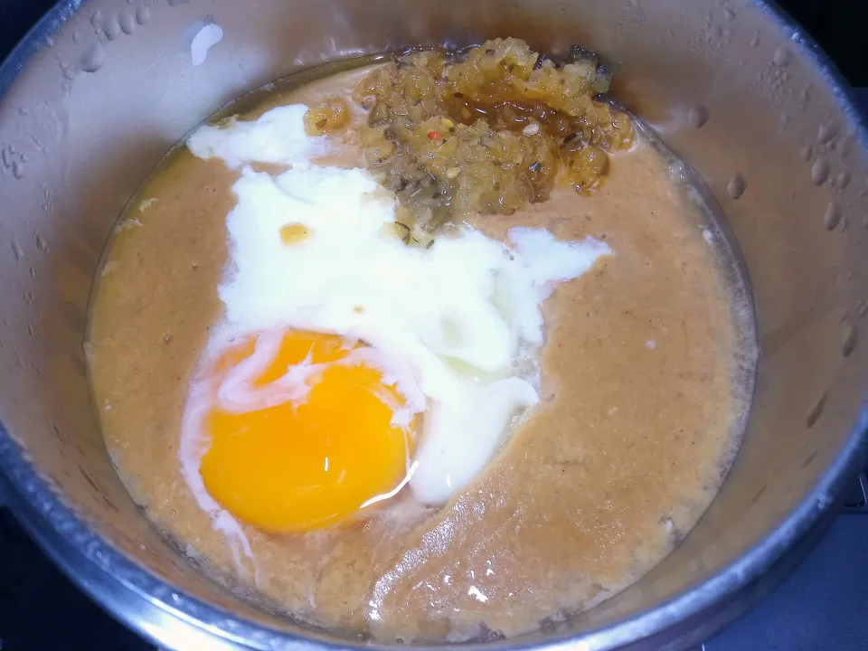 生タマゴ乗せ甘口粉砕カレーライス|darkbaronさん