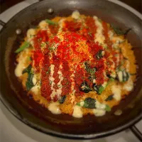 ミートソースと温玉のパエリア|Taiyo Ishikaneさん