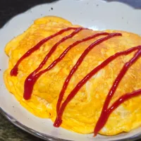 パパ作🥸冷凍ピラフでオムライス|ぱんだのままんさん