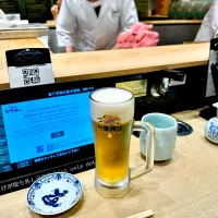 At a sushi bar in Haneda Tokyo|gonbenさん