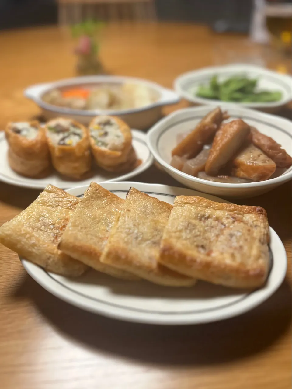 1/25の夕食　キムチ納豆揚げ焼きとお稲荷と煮物|yoneさん