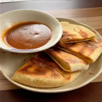 お昼　手作りチーズナンとキーマカレー🫓|renharuruさん