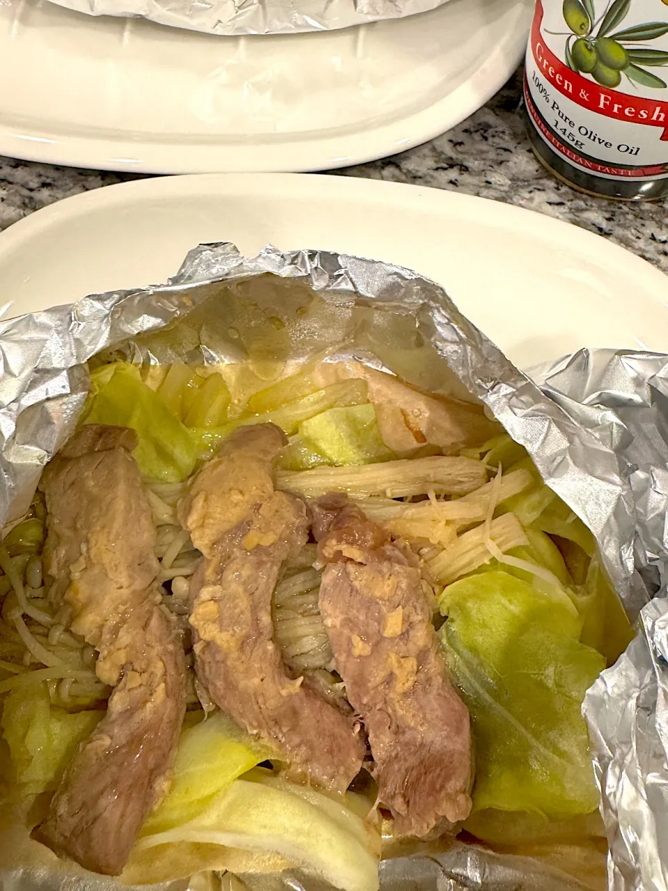豚肉味噌漬けのホイル蒸しにエキストラバージンオリーブオイルかけてみた|mimoさん