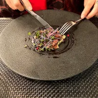 ３月６日のディナー＠「Le detour」さん　温前菜のホタルイカのソテー、プルグルのサラダ添え