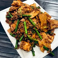 豚肉と厚揚げとニンニクの芽の辛味噌炒め😋|ぽくくんさん