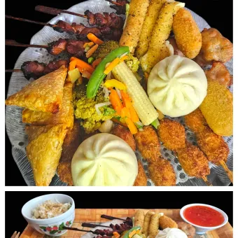 Snapdishの人気料理写真:Mega mix plate with chicken yakitoris,beef lamb samosas, mozzarella sticks, chilli cheese nuggets, coconut curry chicken, bao bun duck,popcorn chicken, vegetabl