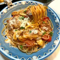 焼いた鳥を半身浴させたトマトソースパスタ|Takeshi  Nagakiさん